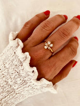 Load image into Gallery viewer, Madison gold flower ring featuring a sparkling five-petal zircon design worn on hand
