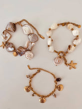 Load image into Gallery viewer, Summer bracelet with ocean-inspired shell pendants and coastal styling
