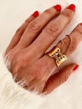 Load image into Gallery viewer, Elegant gold tassel wrapped ring for women in stainless steel with modern statement design
