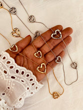Load image into Gallery viewer, Close-up of heart charm necklace detailing
