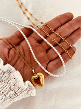 Load image into Gallery viewer, Gold heart locket necklace gift for women with adjustable chain and secure lobster clasp.
