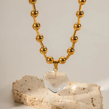 Load image into Gallery viewer, glass heart pendant necklace close up pink and clear elegant detail
