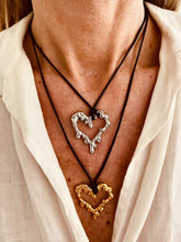 Load image into Gallery viewer, lava heart necklace worn on model casual daily outfit edgy look
