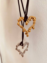 Load image into Gallery viewer, hollow lava heart pendant texture detail stainless steel finish close up
