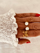 Load image into Gallery viewer, Luxury gold pearl ring worn on hand, adjustable pearl statement ring in gold stainless steel
