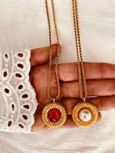 Load image into Gallery viewer, Necklace held in hand showing real size proportions of pendant and chain
