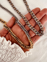 Load image into Gallery viewer, Close up of mixed metal chain necklace showing interlocking gold and silver links

