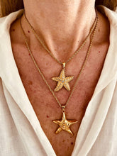 Load image into Gallery viewer, Ocean-inspired outfit styled with starfish pendant necklace
