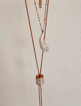 Load image into Gallery viewer, rose gold necklace styled with elegant evening outfit
