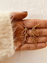 Učitaj sliku u preglednik galerije, Stainless steel leaf hollow stud earrings bold modern statement design
