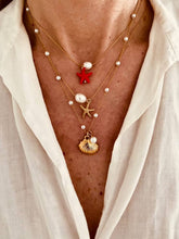 Load image into Gallery viewer, Necklace styled with light summer dress highlighting feminine layered design and coastal inspired details
