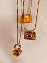 Load image into Gallery viewer, Unique gold necklace with heart pendant and black stone in retro style
