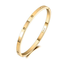 Load image into Gallery viewer, Gold zircon bangle bracelet demonstrating elegant everyday jewelry style
