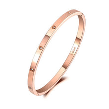 Load image into Gallery viewer, Rose gold zircon bracelet showing soft feminine jewelry aesthetic
